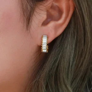 baguette crystal hoop earrings worn on ear close-up side view demonstrating fit and sparkle