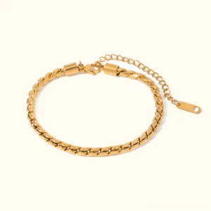 18K gold curb chain bracelet flat lay top view adjustable extender link design luxury jewelry