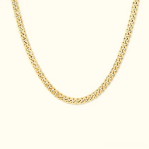 18K gold curb chain necklace flat lay top-down view showing polished interlocking links and golden finish detail