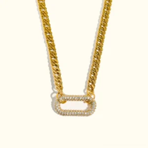18K gold diamond choker necklace with chunky curb chain and oval crystal pendant front view flat lay