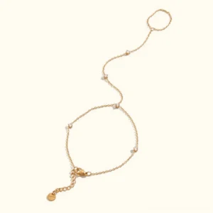 18K gold diamond hand chain flat lay showcase, elegant finger bracelet with cubic zirconia stones, adjustable wrist to finger chain design