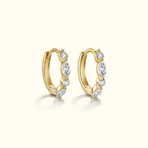 18K gold diamond huggie hoop earrings front view flat lay showing ethically sourced gemstones and gold plating