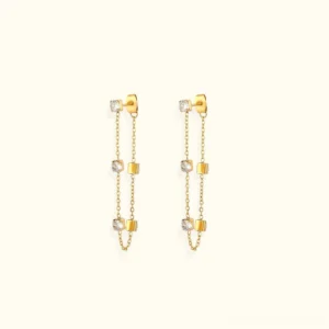 18K gold diamond simulant chain dangle earrings front flat lay view with square metal accents and round cubic zirconia gems