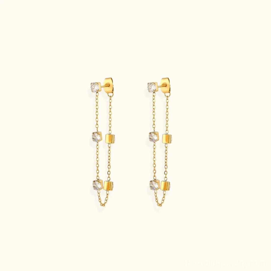 18K gold diamond simulant chain dangle earrings front flat lay view with square metal accents and round cubic zirconia gems