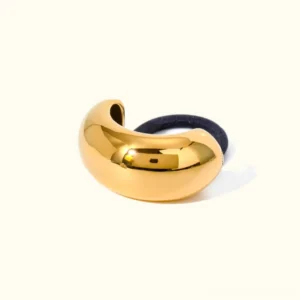 18K gold dome ponytail cuff with elastic band, polished gold finish front flat lay view