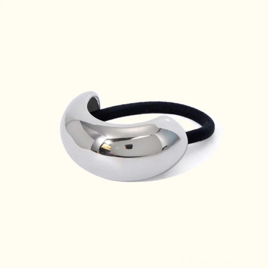 Silver dome ponytail cuff with elastic band, smooth bean shape front flat lay