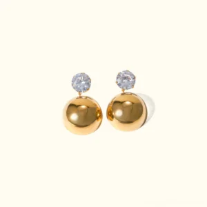 18K gold dome stud earrings with diamond simulant, polished gold finish, flat lay product photography against plain background