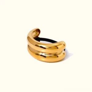 18K gold double arch hair cuff with dual curved bands and black hair elastic on white background front view