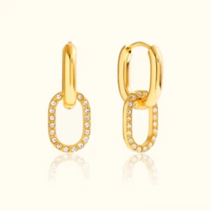 18K gold double hoop diamond earrings with interlocking design, front view flat lay showing polished gold and pavé diamond bands