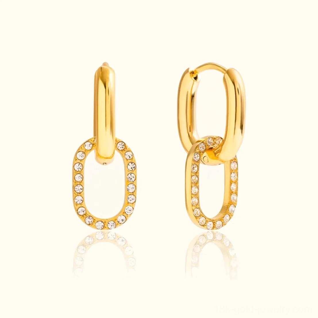 18K gold double hoop drop earrings close-up on model earlobe, side view with blonde hair detail