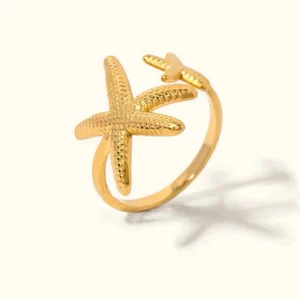 18K gold double starfish adjustable open cuff ring front view flat lay isolated white background