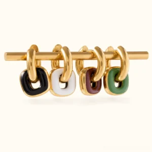 18k gold enamel drop hoop earrings flat lay - all four colors white black green burgundy on white background studio shot