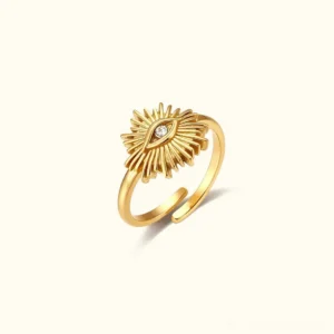 18K gold evil eye sunburst ring flat lay product shot, showing polished finish and cubic zirconia center stone on white background