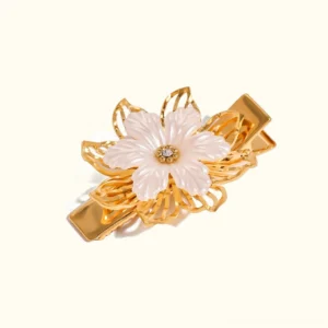 18K gold floral pearl hair clip front view flat lay - genuine freshwater pearl and gold petal design on white background