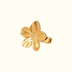 18K gold flower hair clip front flat lay view minimalist sculptured petal design polished gold finish