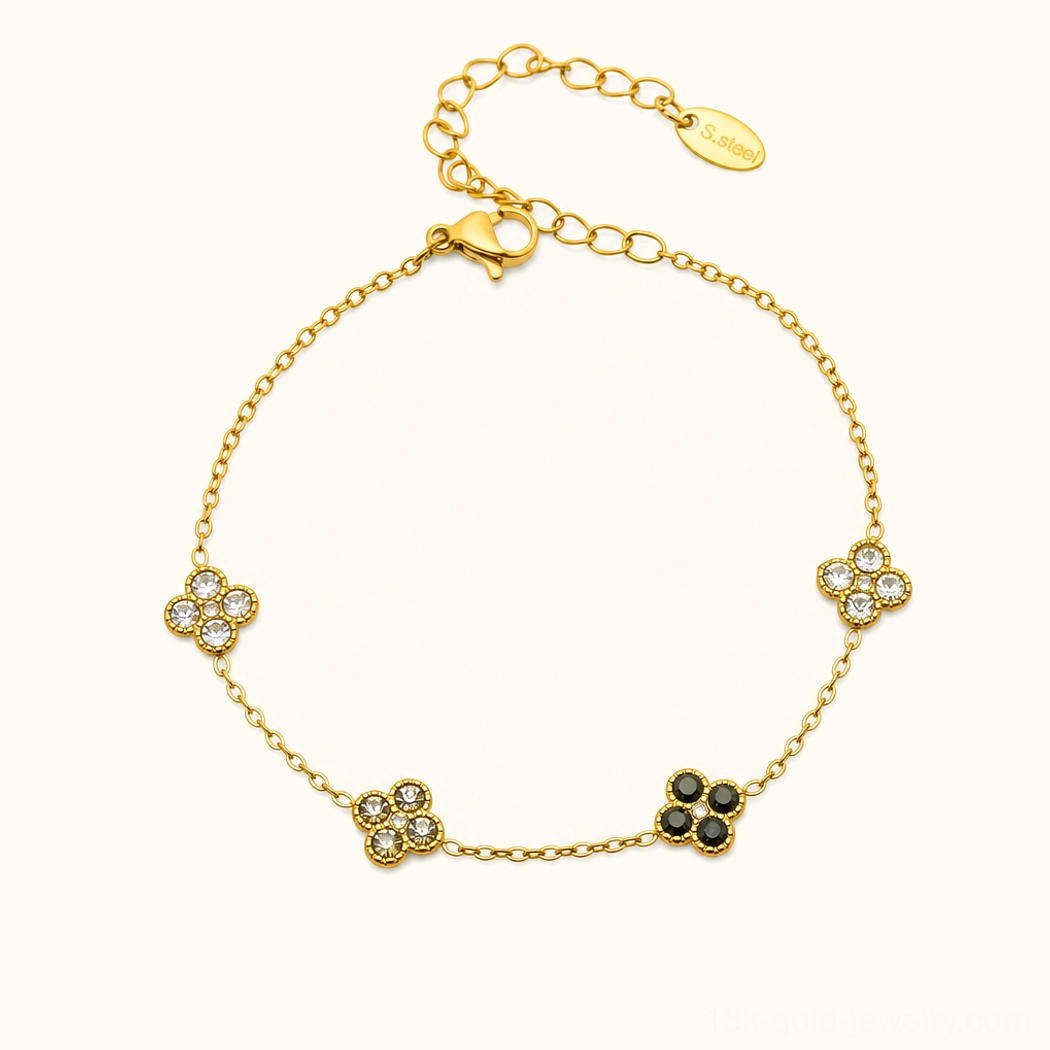 18K black gold four-leaf clover bracelet with white and onyx gemstone charms, professional product photography