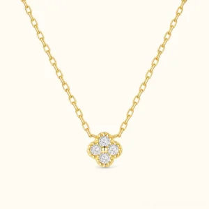 18K Gold Four-Leaf Clover Diamond Necklace with sparkling zirconia pendant on delicate cable chain, flat lay shot showing full length and design detail