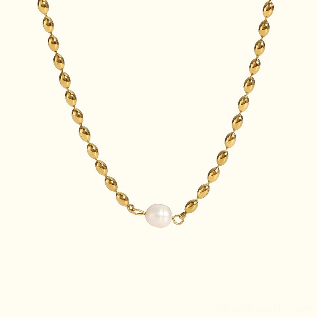 18K gold freshwater pearl necklace with delicate beaded chain and single white pearl on white background - front view flat lay
