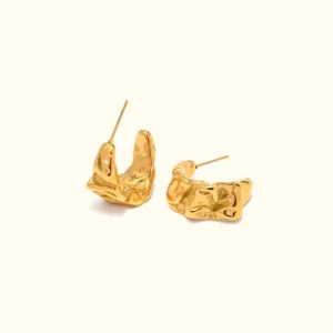 18K gold hammered hoop earrings with textured molten finish, front flat lay view on neutral background