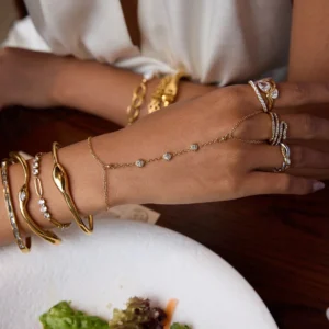 18K Gold Hand Chain Worn with Stacked Bangles and Rings - Styling Close-Up