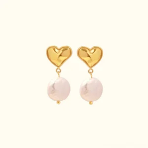 18K gold heart freshwater pearl drop earrings front flat lay view with neutral background, polished gold studs and iridescent baroque pearls