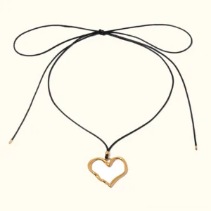 18K gold hollow heart pendant necklace with black wax cord, front flat lay view on white background, freeform irregular heart charm jewelry