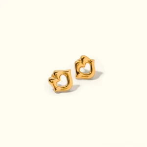 18K gold hollow heart stud earrings flat lay photography premium jewelry product shot