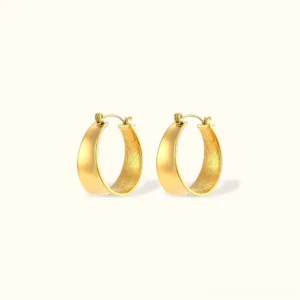 Lyla 18K gold textured hoop earrings with feather engraved inner surface, front flat lay view showcasing minimalist wide chunky design