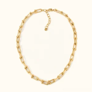 18K gold horseshoe link necklace flat lay front view showcasing architectural hollow rectangular chain links polished gold finish adjustable length