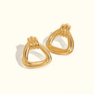 18K gold knot triangle drop earrings flat lay, polished gold twisted knot design in hollow triangle frame, luxury jewelry photography