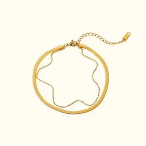 18K gold layered anklet flat lay - double chain design with snake chain and bead link