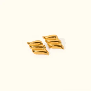 18k gold layered wing stud earrings top flat lay view polished finish