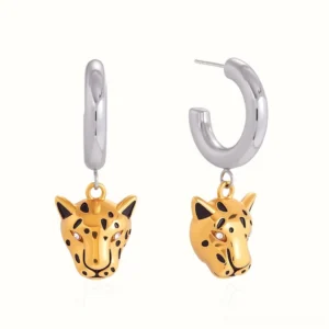 18K gold leopard drop hoop earrings two-tone design front view flat lay with silver hoops and detailed gold leopard charms featuring black spotted pattern