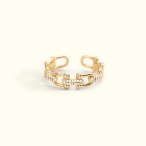 18K gold link chain ring with crystal accents flat lay front view adjustable open cuff design