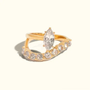 18K gold marquise diamond ring with pavé accent stones in studio light - elegant double-layer design showing full frontal view