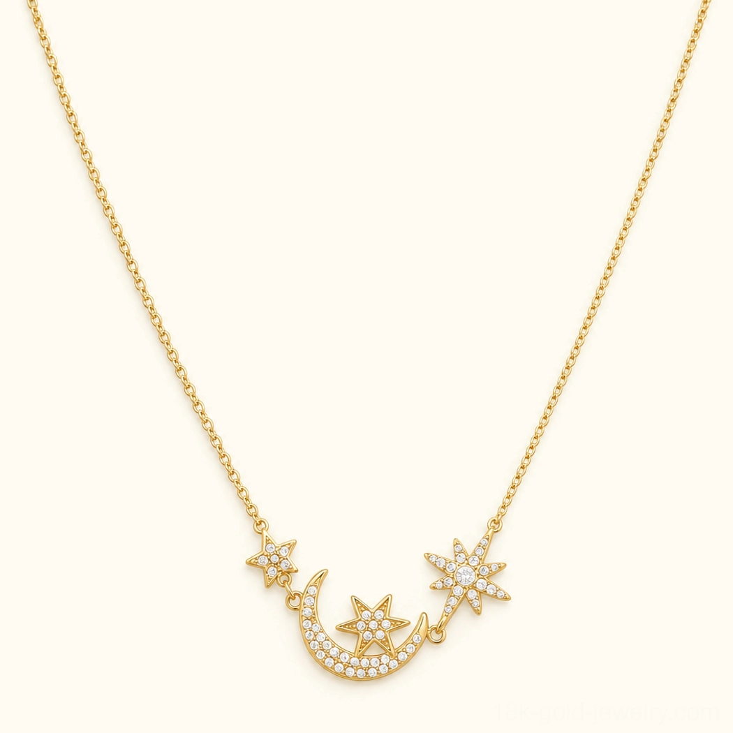 18K gold star moon pendant necklace front flat lay shot showing gold curb chain with pavé moon and star charms on neutral background