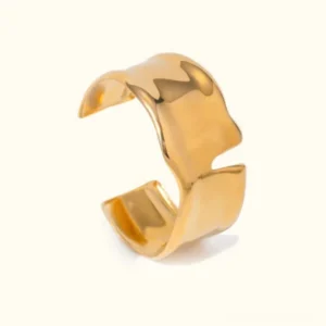 18K gold open cuff bracelet with irregular wavy edge design, polished finish, left front 3/4 view on white background