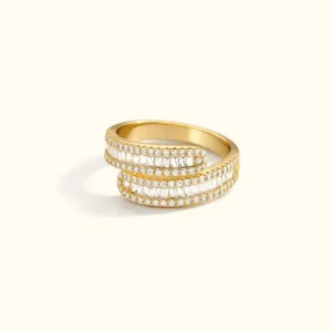 18K Gold open-ended pave ring with AAA diamond simulants, flat lay product view showcasing spiral design and cubic zirconia sparkle