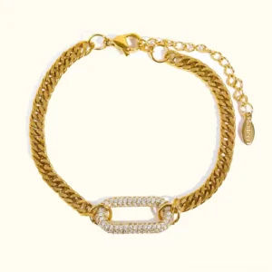 18K gold pave diamond link bracelet with curb chain and rectangular zircon charm on white background - elegant top view flat lay