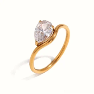 18K gold pear-cut diamond teardrop ring front studio view polished bypass band