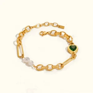 18K gold pearl chain bracelet with green heart charm flat lay display showing freshwater pearls and gold-plated mixed link chain design