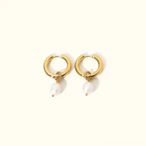 18K gold pearl drop earrings front view flat lay featuring polished gold hoops with natural baroque freshwater pearls