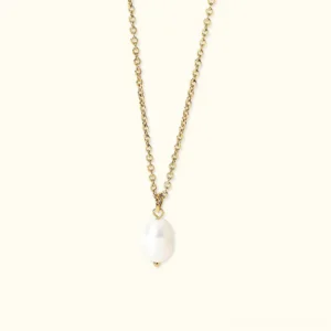 18K gold freshwater pearl drop necklace flat lay overhead view showing twisted cable chain and teardrop pearl pendant on neutral background
