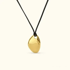18K gold pebble pendant necklace with black wax cord on clean white background - smooth organic teardrop shape minimalist design