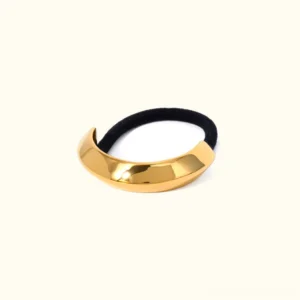 18K gold petite arch hair cuff with black elastic band, top-down flat lay view on plain background, polished finish