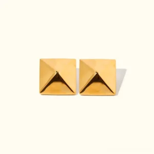 18K yellow gold pyramid stud earrings front flat lay view polished faceted geometric design