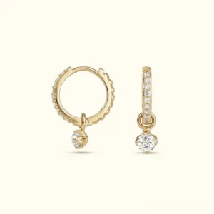 18K gold reversible diamond hoop earrings with detachable cubic zirconia pendant, flat lay front view showing pavé setting and interchangeable charm