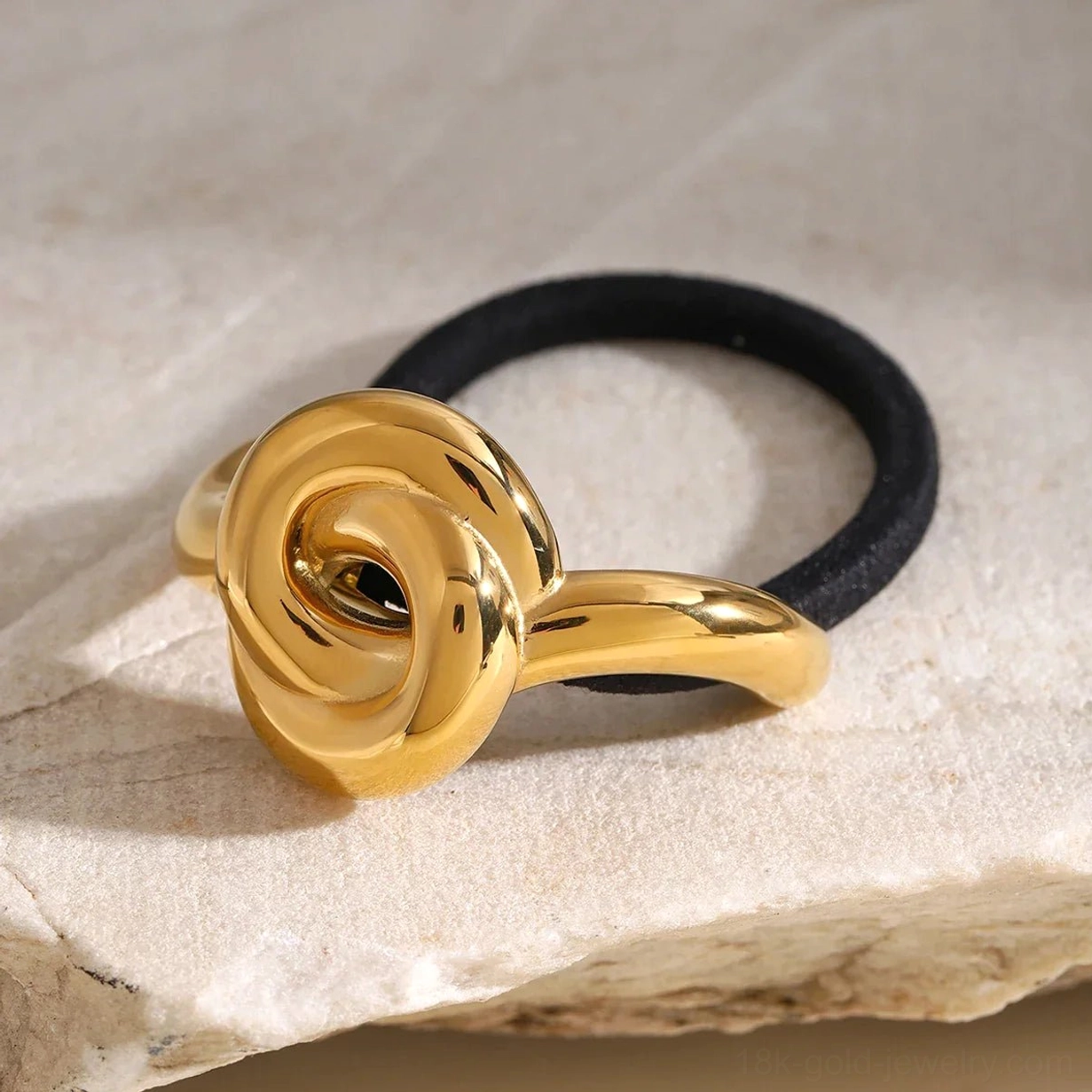 18K gold rose knot hair cuff bright polished metal side angle detail shot