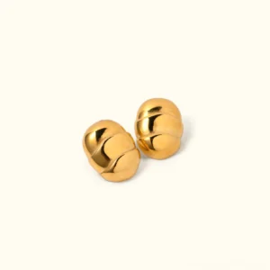 18K gold scarab stud earrings croissant design polished finish flat lay product shot