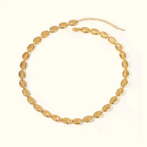 18K gold seashell necklace flat lay - textured shell chain links with adjustable extender on white background